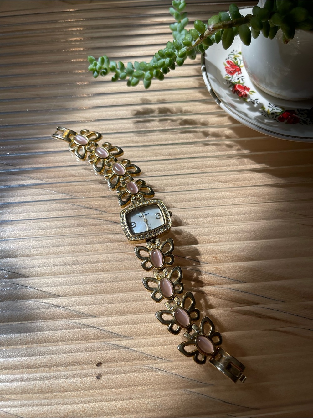Gold Butterfly Bracelet Watch with Lavender Gems
